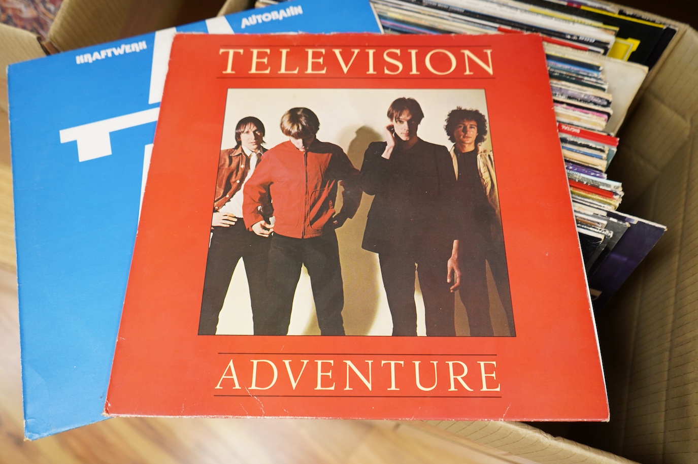 Fifty 1970's LP record albums, together with a few classical albums, artists include; Television, Kraftwerk, the soft machine, AC/DC, Randy Newman, Tracy Chapman, Wet Willies, Blood Sweat & Tears, Alice Cooper, Chicago,